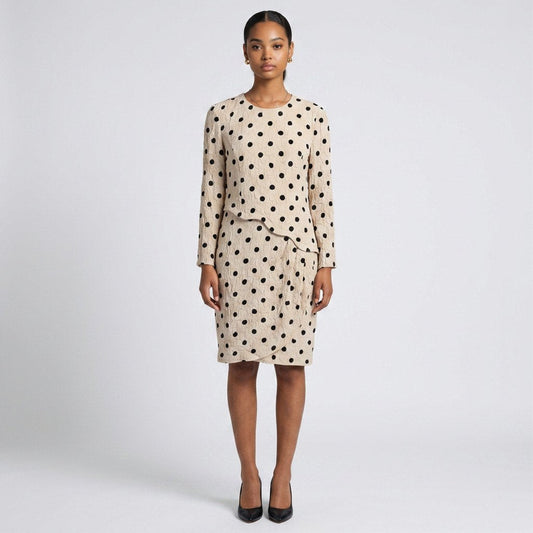 Lynn's Closet Boutique vintage Louis Feraud cream and black polka dot textured long-sleeve dress on a model