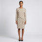 Lynn's Closet Boutique vintage Louis Feraud cream and black polka dot textured long-sleeve dress on a model