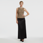 Model wearing a Lynn's Closet Boutique vintage CMV brown and tan sequin sleeveless top with a black maxi skirt.