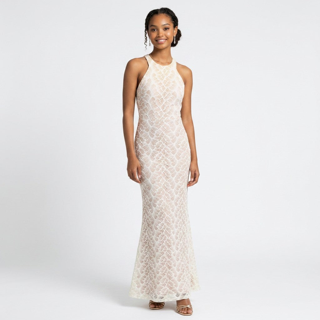 Model wearing a Lynn's Closet Boutique white lace floor-length gown with a high neckline and fitted silhouette.