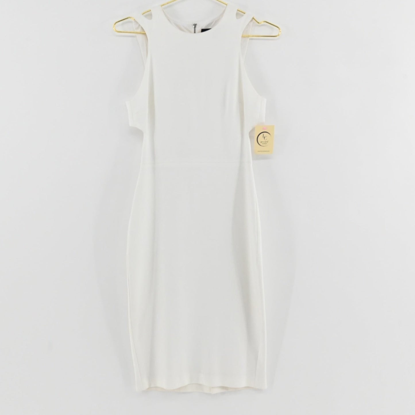 Lynn's Closet Boutique French Connection white midi dress with cold-shoulder cutouts and side waist detailing.