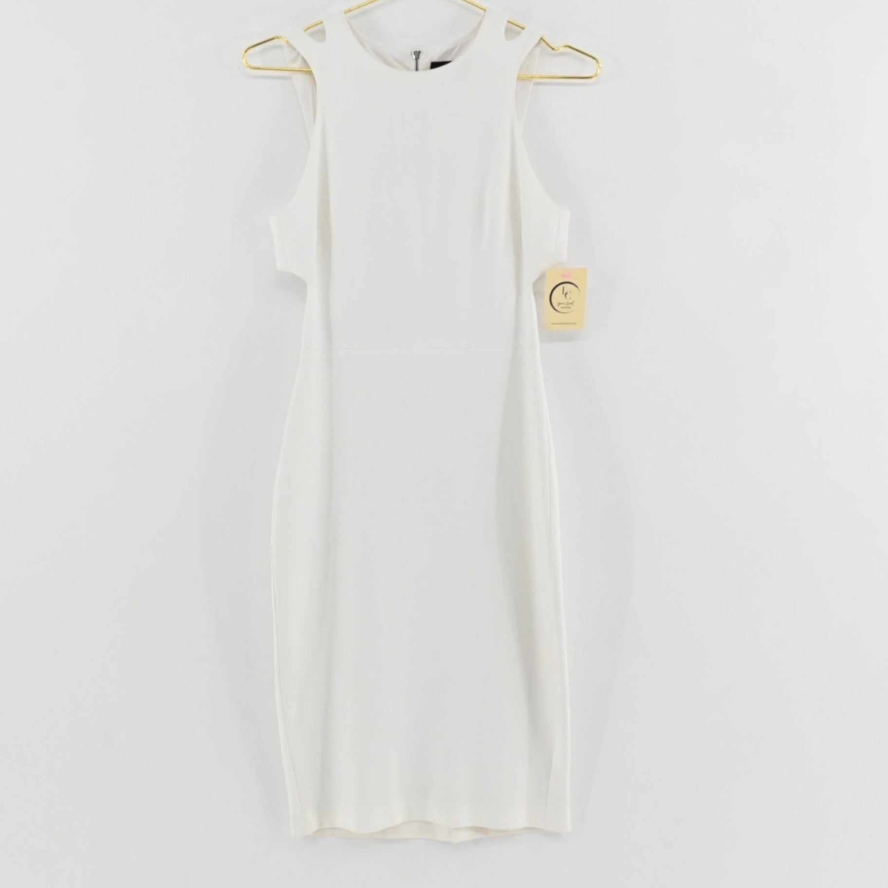 Lynn's Closet Boutique French Connection white midi dress with cold-shoulder cutouts and side waist detailing.