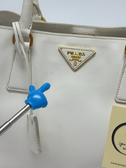 Lynn's Closet Boutique white Prada Galleria Saffiano leather handbag with gold logo plaque and top handle detail