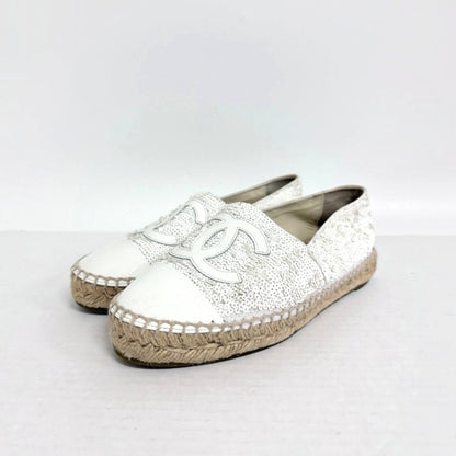 Lynn's Closet Boutique white sequin Chanel espadrilles with CC logo, leather toe cap, and jute sole.