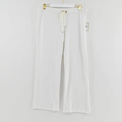 Lynn's Closet Boutique white textured wide-leg pants by Lilly Pulitzer with an elastic drawstring waist and gold accents.