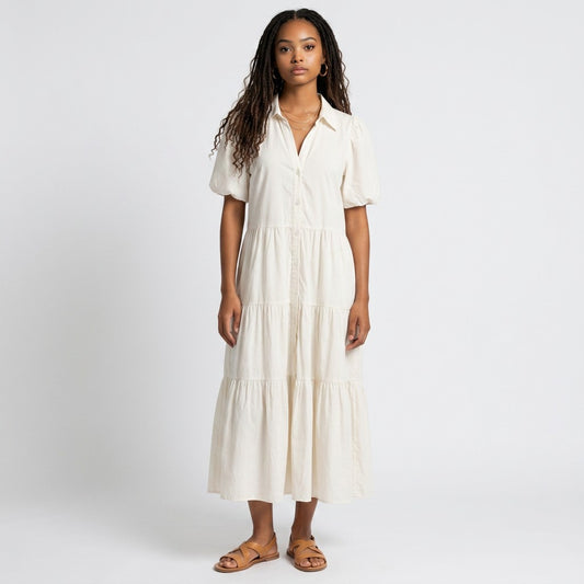 Lynn's Closet Boutique Brochu Walker white tiered midi dress with a collar and puff sleeves worn by a model