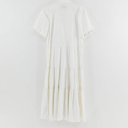 Lynn's Closet Boutique white midi tiered dress with puff sleeves and collared neckline, back view.