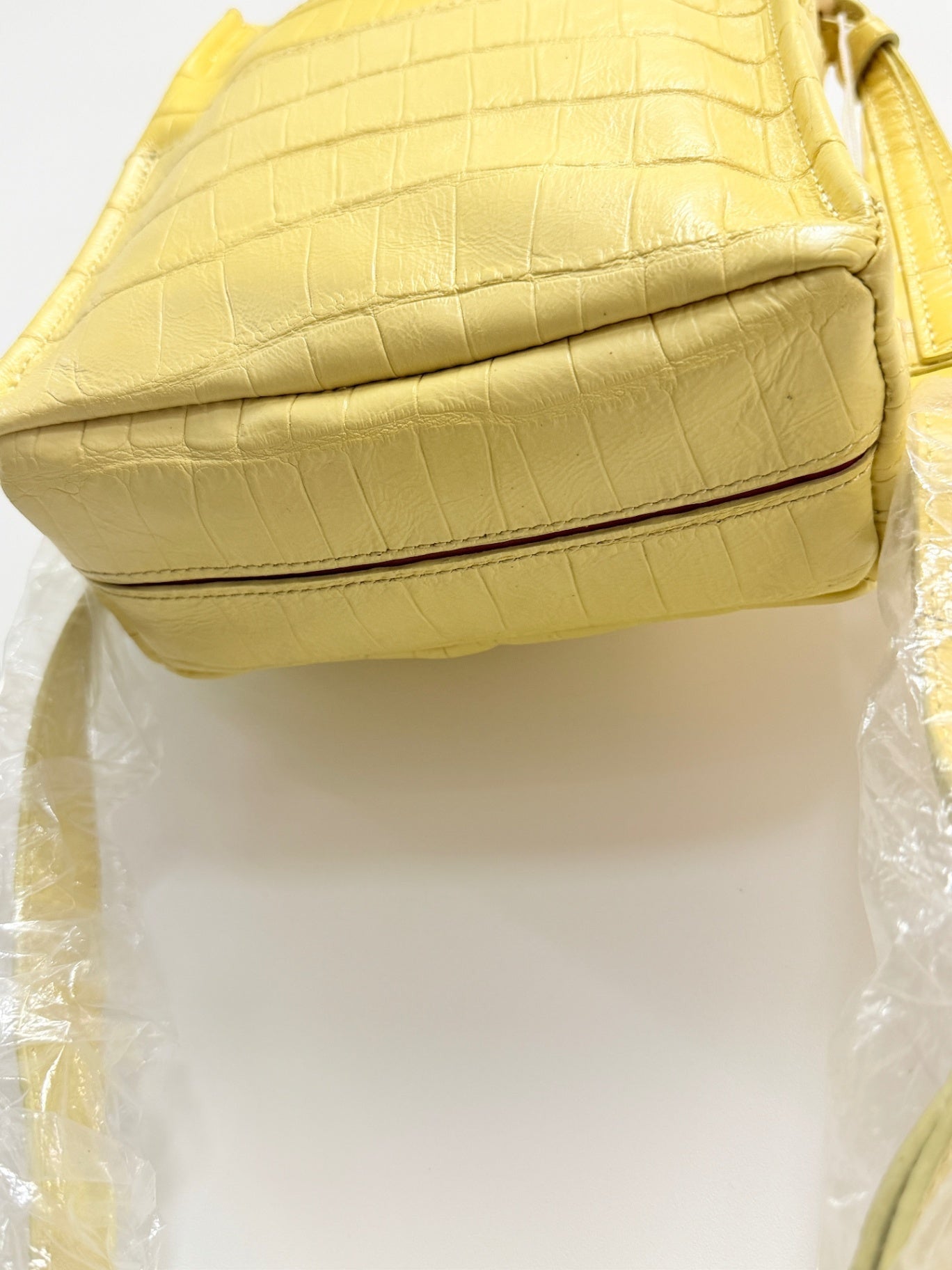 Lynn's Closet Boutique Hammitt Sunstruck yellow leather crossbody bag with a crocodile-embossed texture and base view.
