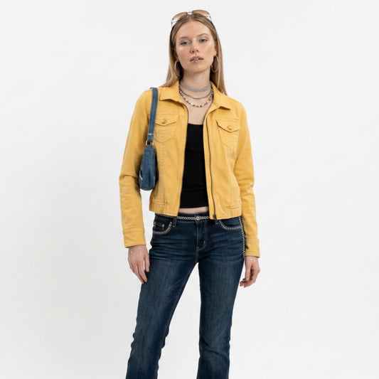 Model wearing a yellow American Eagle zip-up trucker jacket from Lynn's Closet Boutique with dark blue jeans