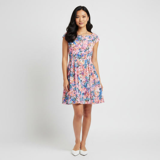 Betsey Johnson floral print dress in pink, blue, and orange. Size 2, short cap sleeves, and a flared skirt.