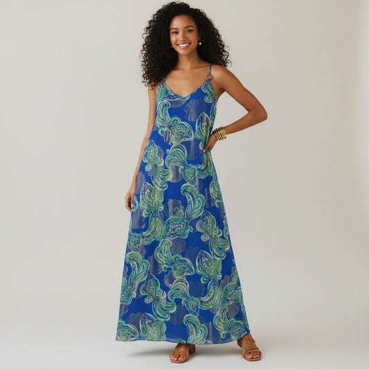 Lynn's Closet Boutique blue silk maxi dress with gold and green paisley print, spaghetti straps, and ring details.