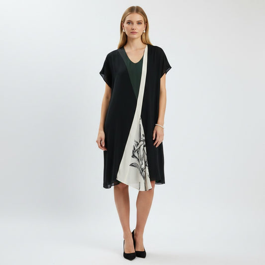 Lynn's Closet Boutique Bouchra Jarrar black dress with green trim, sheer overlay, and botanical print panel. Size L.