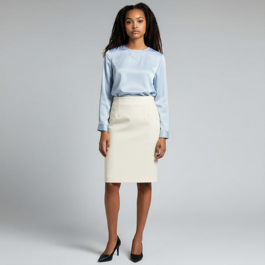 Lynn's Closet Boutique vintage Fendi cream A-line skirt, size 42, with vertical panel seams and hidden back zip.
