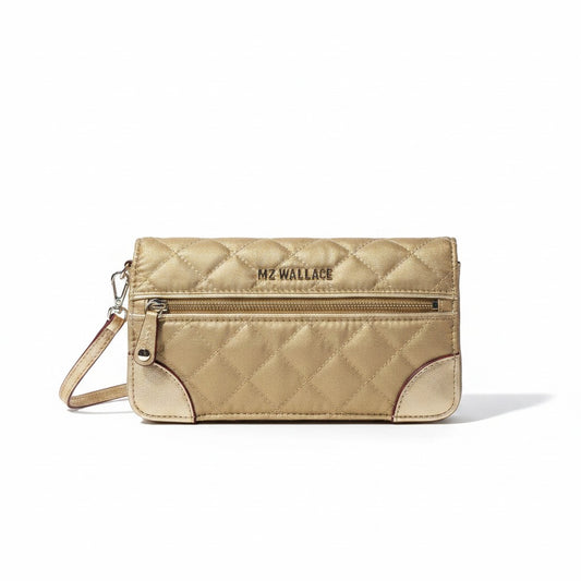 Lynn's Closet Boutique MZ Wallace gold quilted wristlet with zip closure and detachable strap.