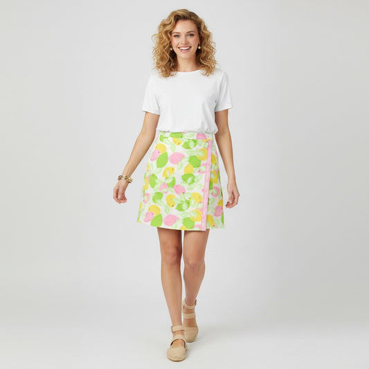 Lynn's Closet Boutique vintage Lilly Pulitzer size 4 skort with a white background, featuring a vibrant lemon and lime print with pink accents and a decorative pink trim.