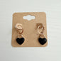Gold black enamel heart drop earrings