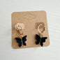 Gold black butterfly drop earrings