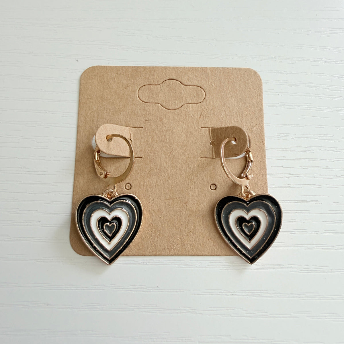 Gold black and white layered heart drop earrings