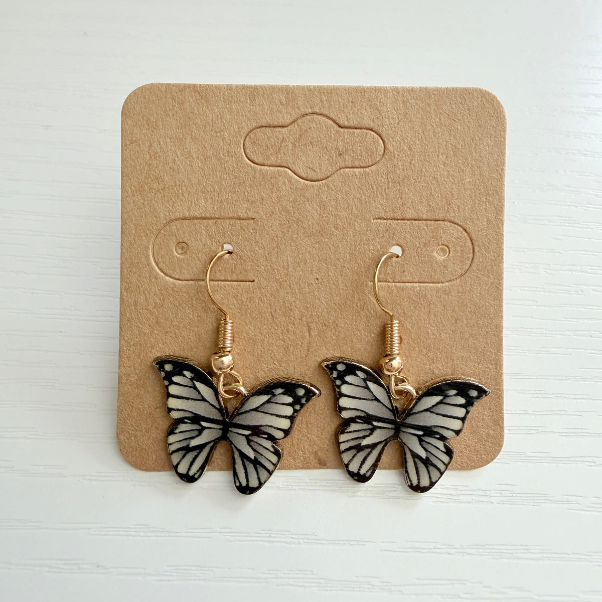 Gold monarch butterfly wing drop earrings
