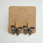 Gold monarch butterfly wing drop earrings