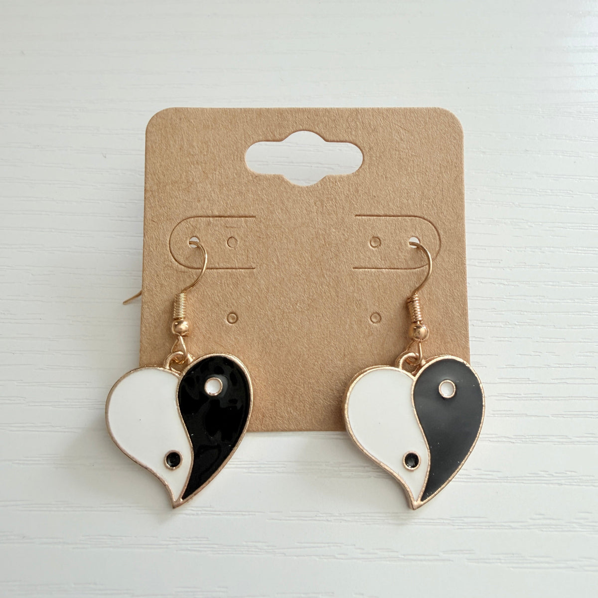 Gold yin yang heart drop earrings
