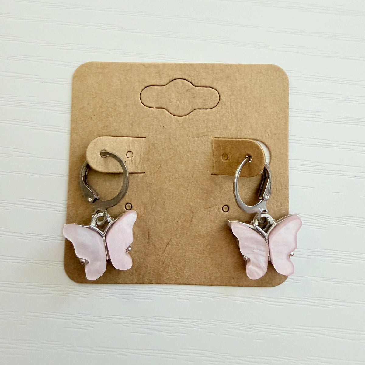 Silver pink butterfly drop earrings