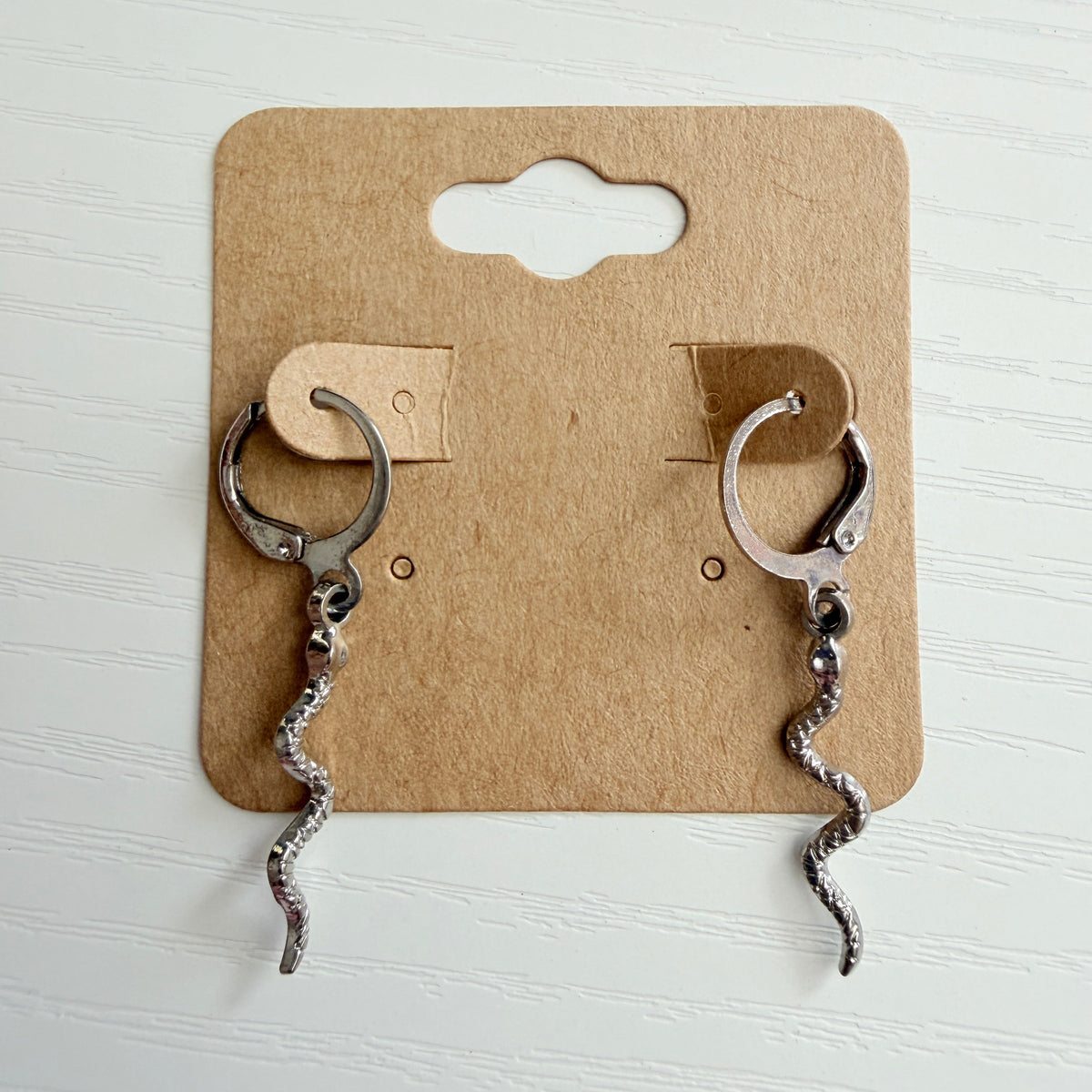Silver snake dangle earrings