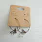 Silver butterfly charm hoop earrings
