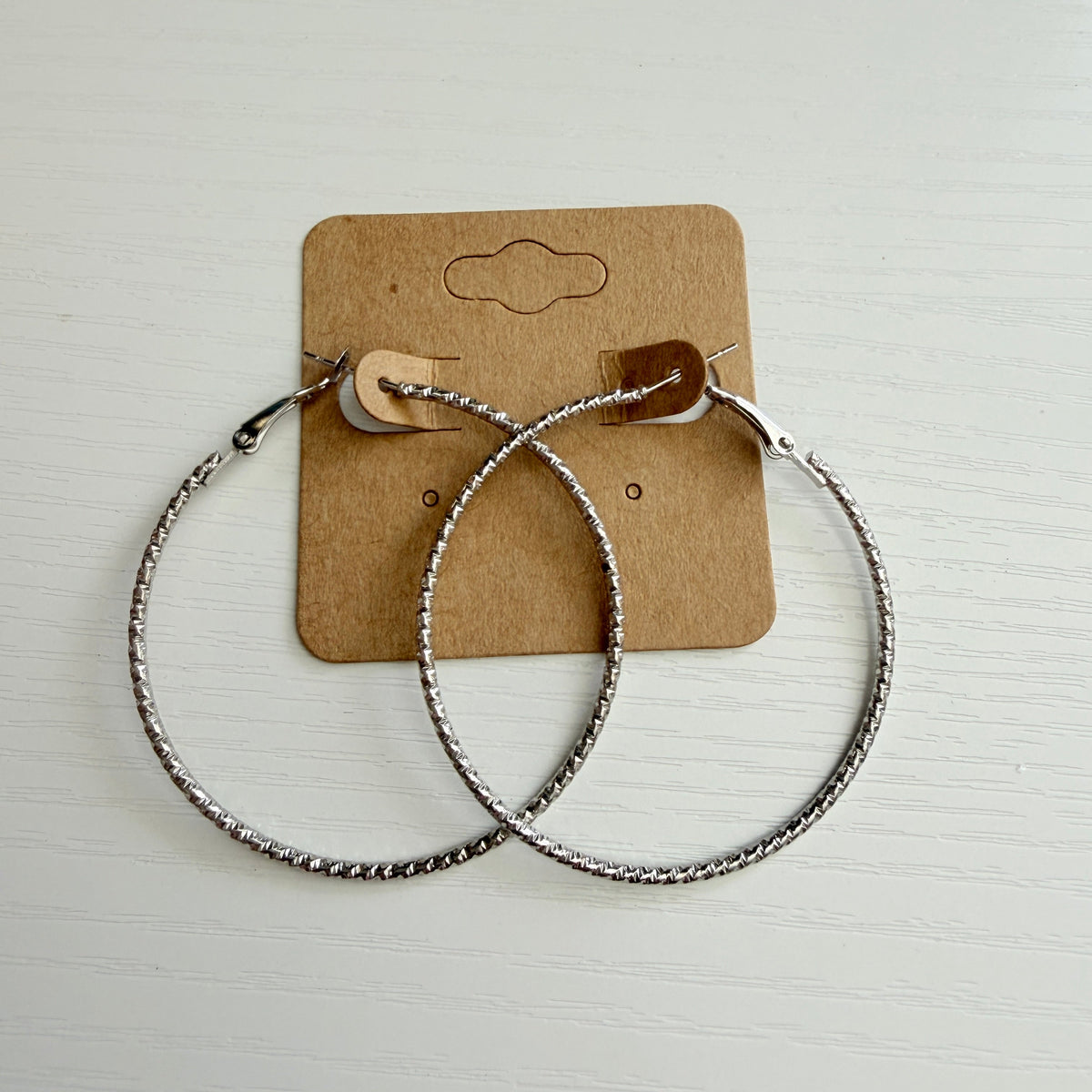 Silver textured large hoop earrings
