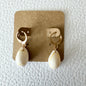 Gold cowrie shell drop huggie earrings