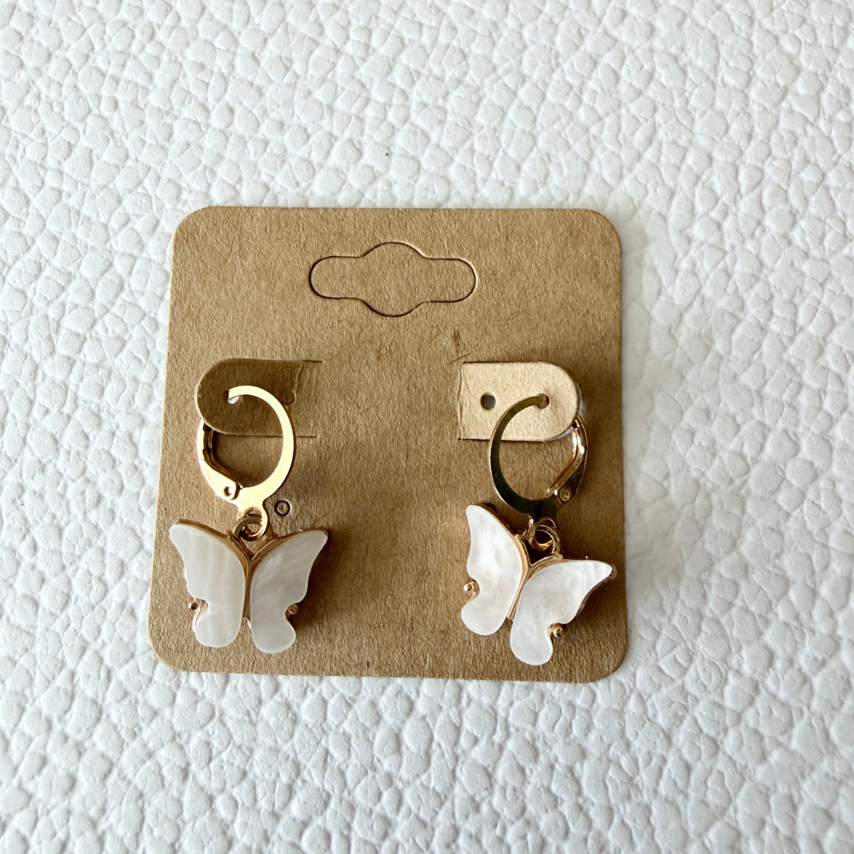 Gold white butterfly drop huggie earrings