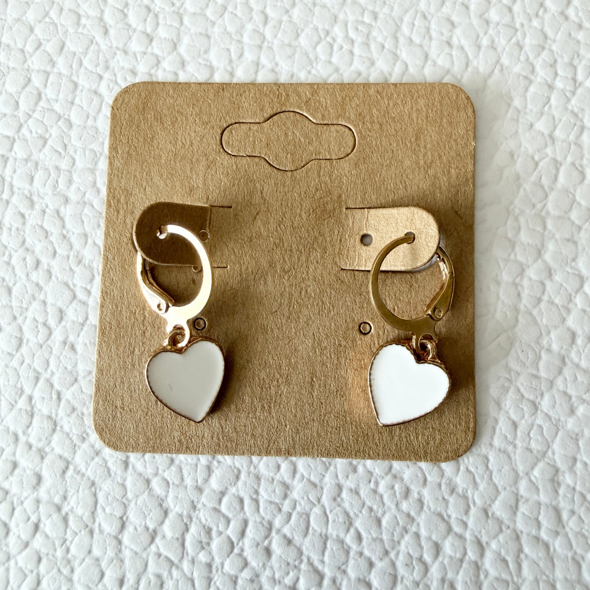 Gold white enamel heart drop huggie earrings